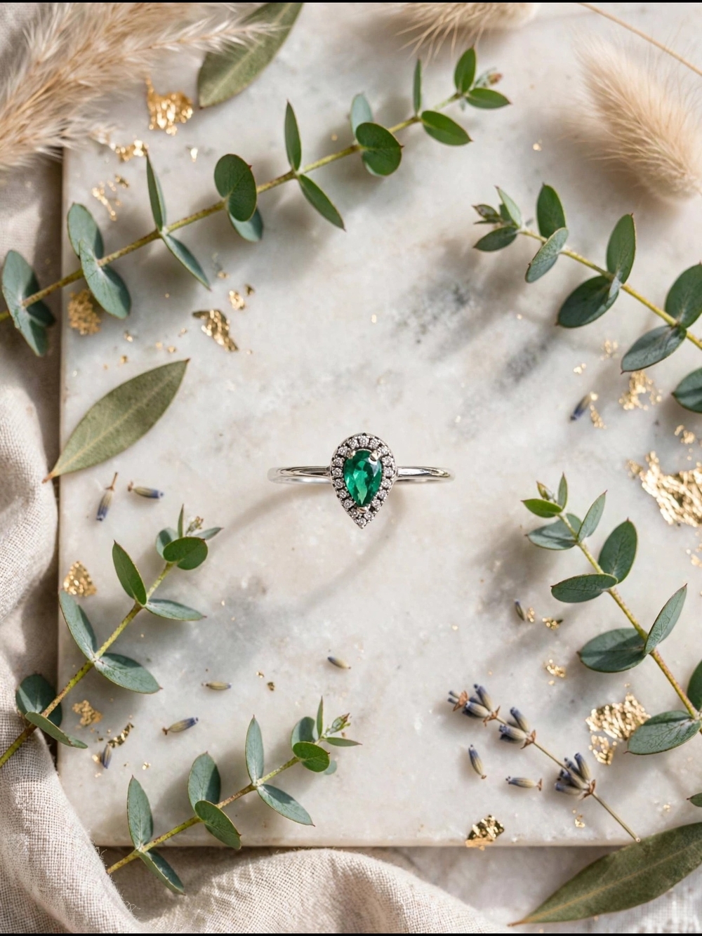 Teardrop Emerald Halo Ring in Sterling Silver